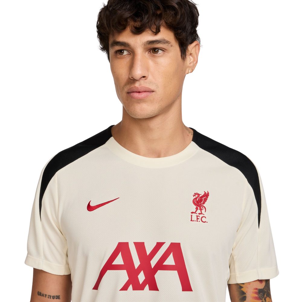 Liverpool FC Strike T-Shirt 24/25 - Coconut Milk/Black/Red by Nike at NUMBER 10 - Buy Now!