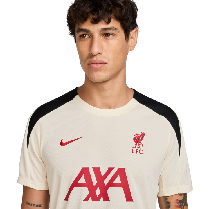 Liverpool FC Strike T-Shirt 24/25 - Coconut Milk/Black/Red by Nike at NUMBER 10 - Buy Now!