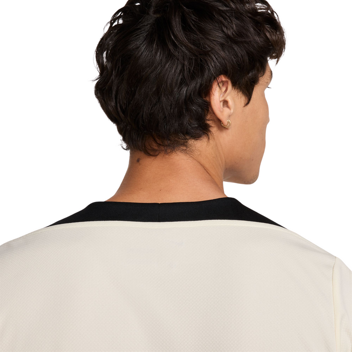 Liverpool FC Strike T-Shirt 24/25 - Coconut Milk/Black/Red by Nike at NUMBER 10 - Buy Now!
