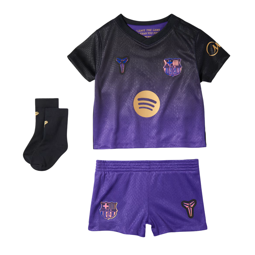 Nike FC Barcelona Away Mini Kit 26/27, featuring blue jersey and shorts with team logo and Nike branding.