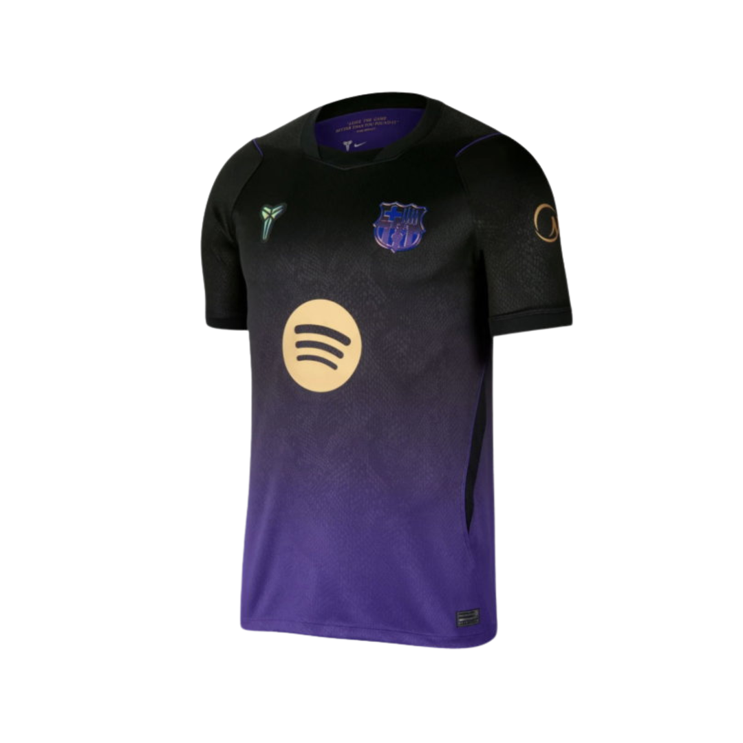 Nike FC Barcelona Youth Stadium Away Shirt 26/27, front view showing blue and maroon design with team logo and Nike branding.